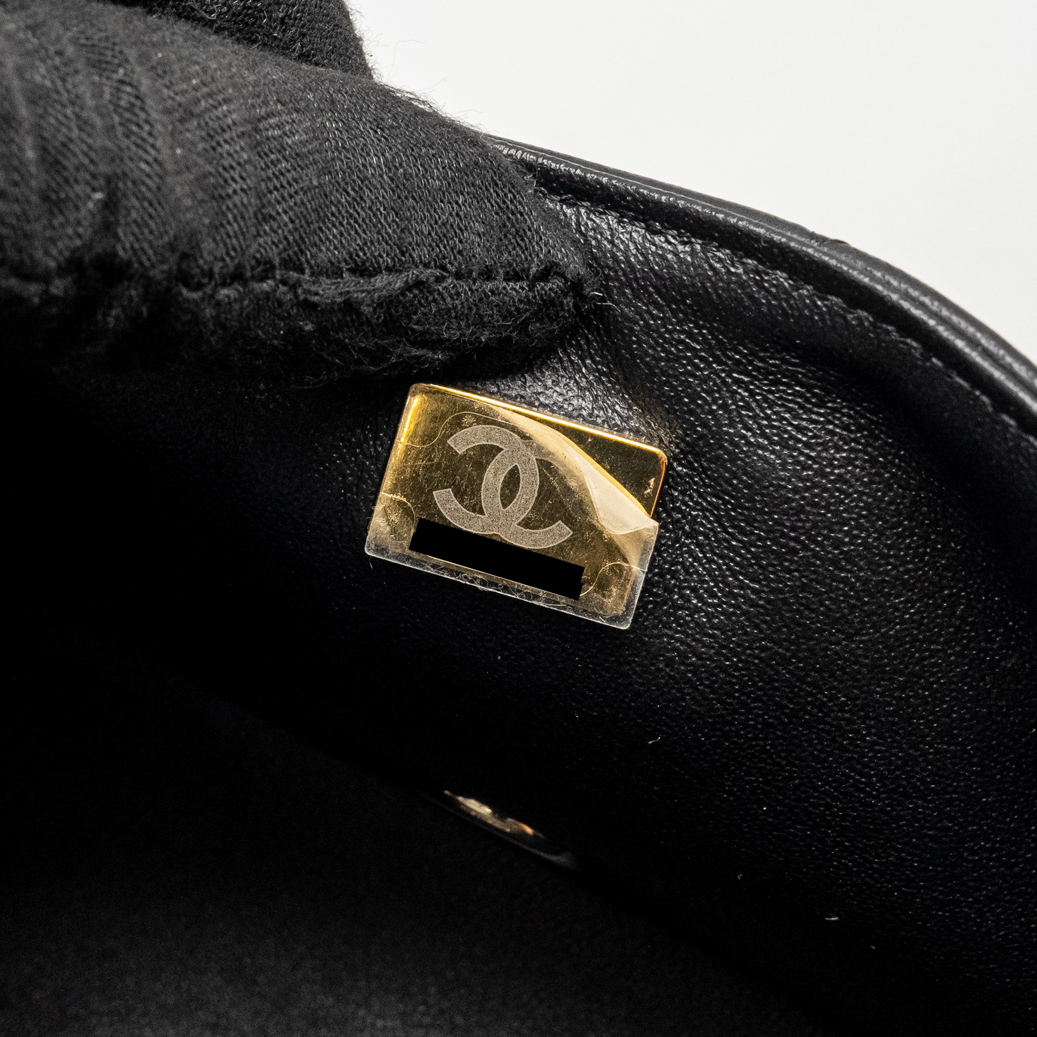 chanel-mini-rectangular-flap-bag-lambskin-black-lghwmicrochip-1