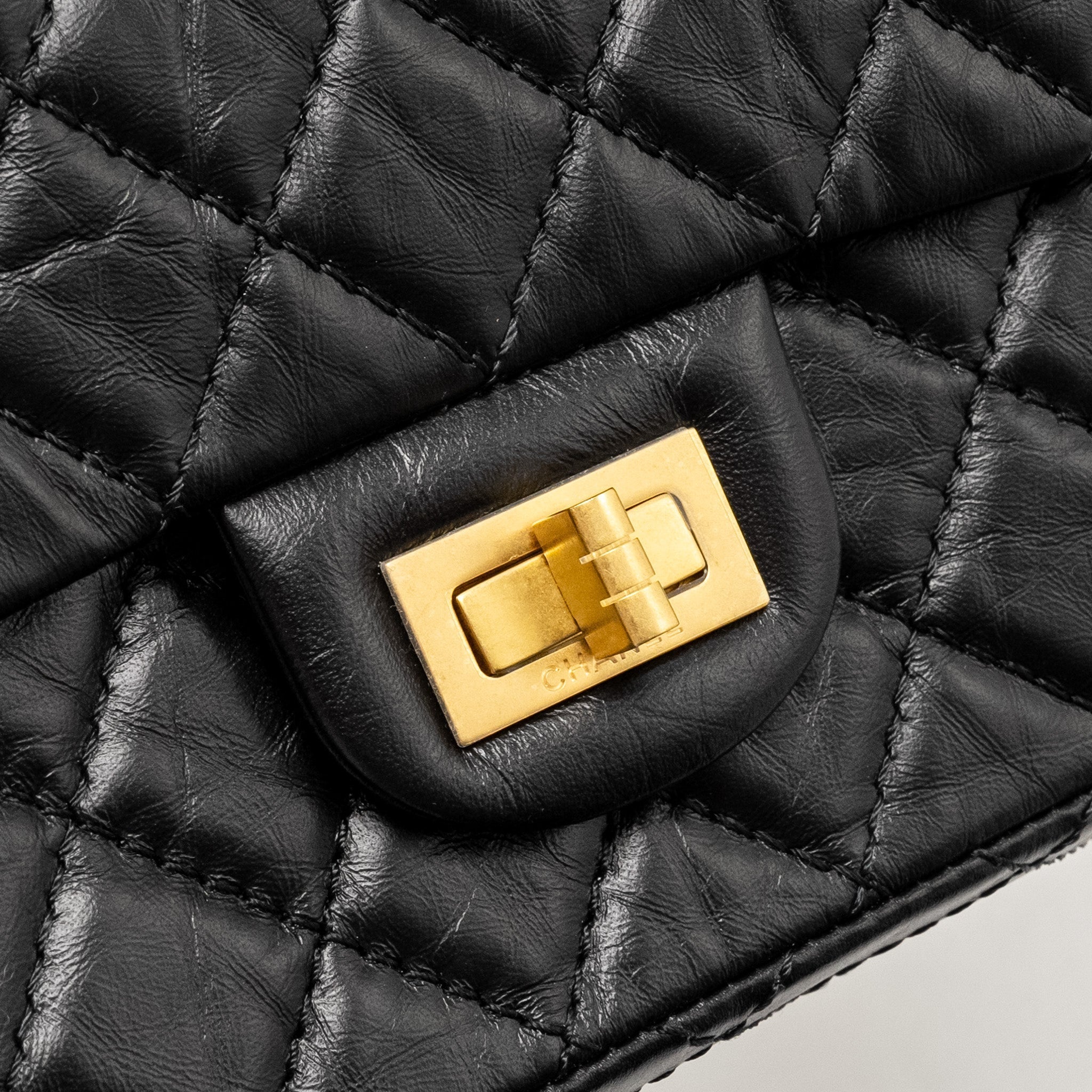 chanel-mini-2-55-reissue-flap-bag-aged-calfskin-black-brushed-ghw-microchip-copy