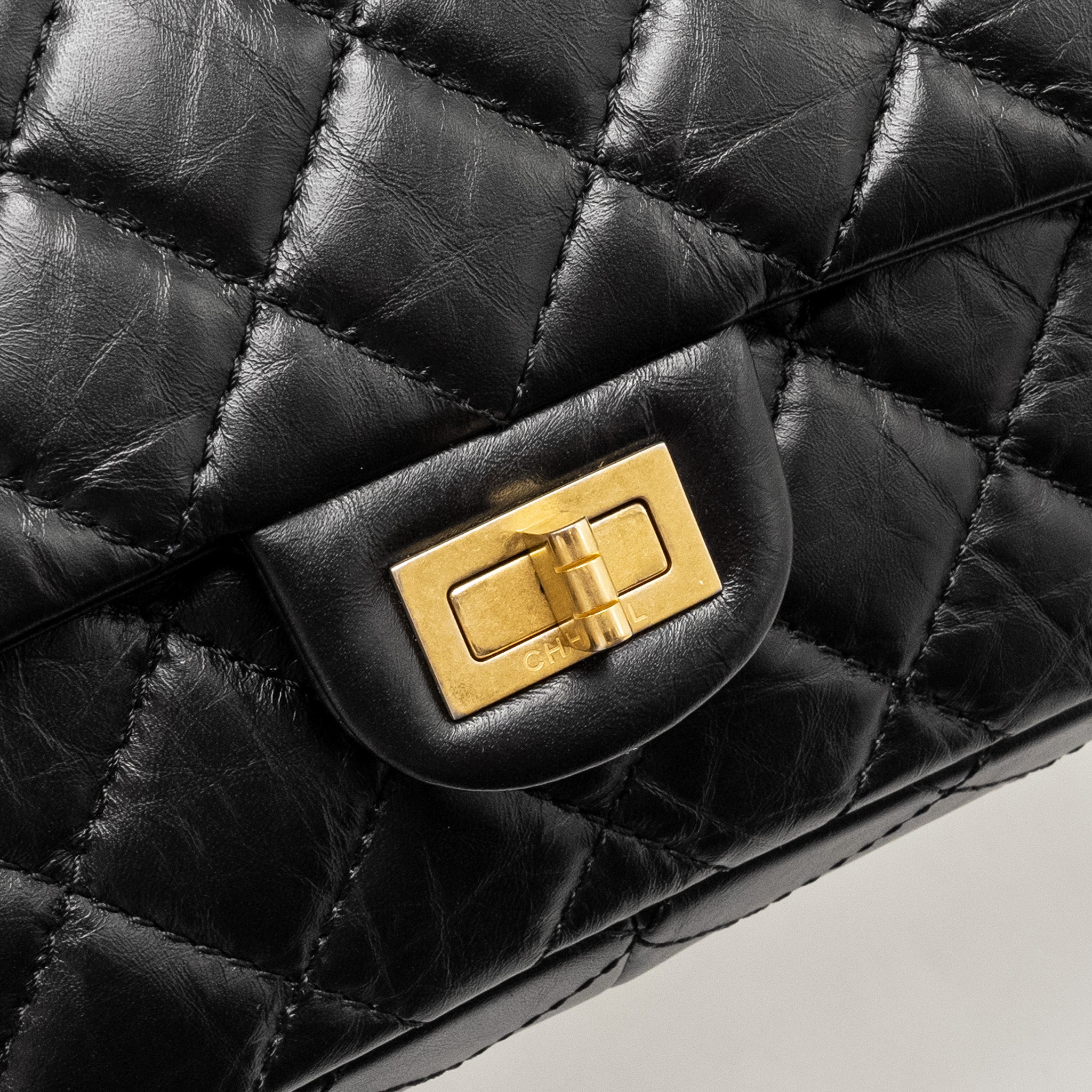 chanel-large-2-55-reissue-flap-bag-aged-calfskin-black-ghw-1