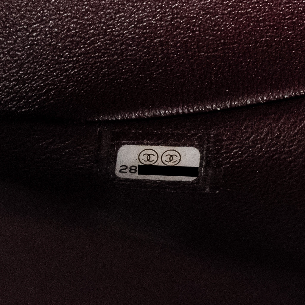chanel-large-2-55-reissue-flap-bag-aged-calfskin-black-ghw-1