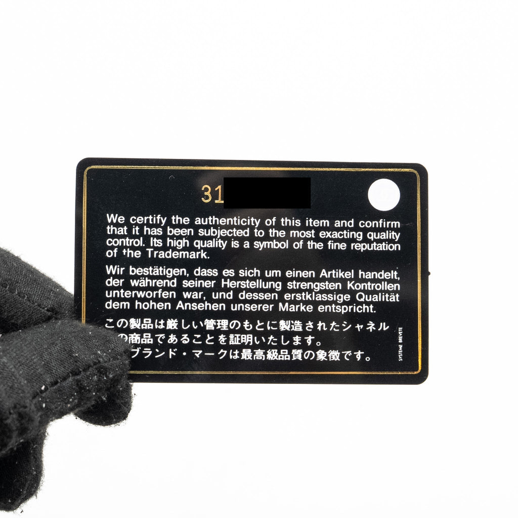 chanel-cc-round-vanity-case-with-chain-lambskin-black-lghw