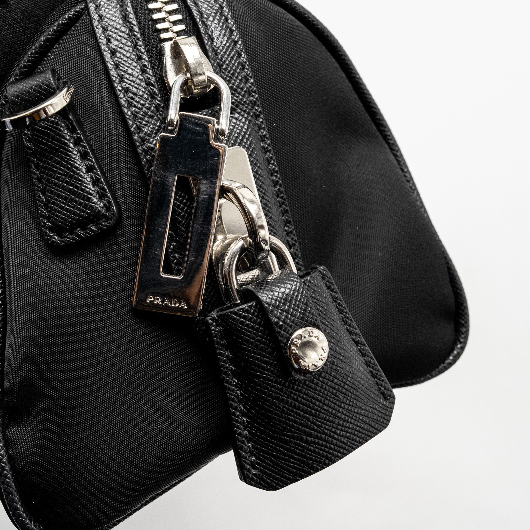 prada-top-handle-re-edition-2005-nylon-bag-black-shw