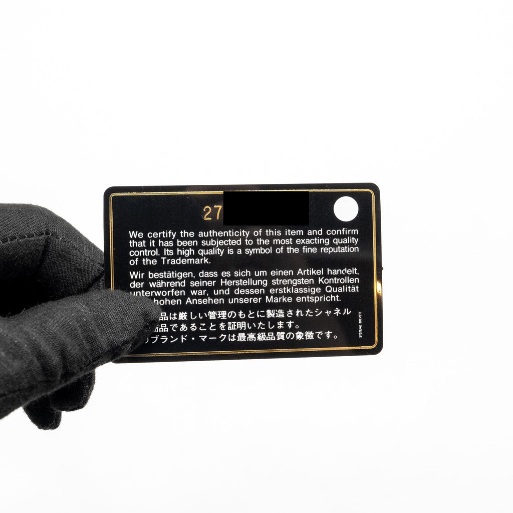 chanel-mini-filigree-vanity-clutch-caviar-beige-black-ghw