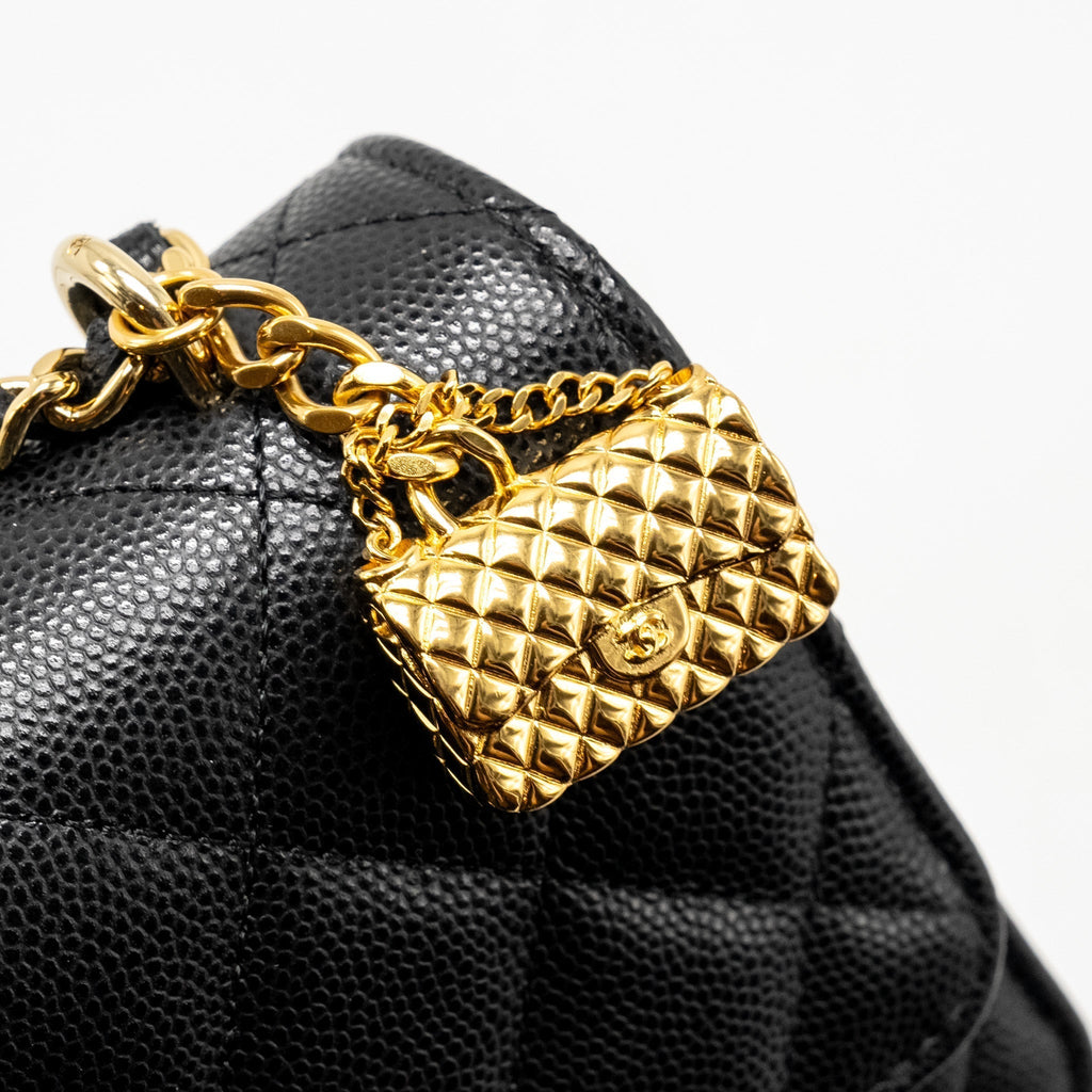 chanel-23s-wallet-on-chain-with-bag-charm-caviar-black-ghwmicrochip-1
