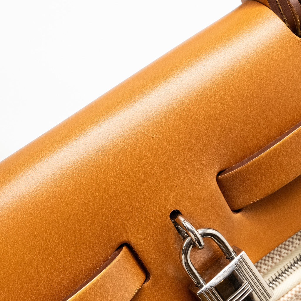 hermes-herbag-31-zip-bag-toile-criss-viking-vache-hunter-leather-ecru-beige-nature-nature-shw-stamp-y