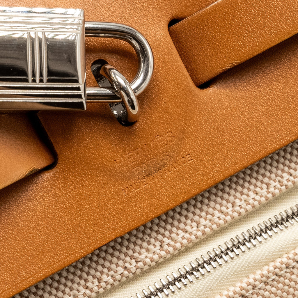 hermes-herbag-31-zip-bag-toile-criss-viking-vache-hunter-leather-ecru-beige-nature-nature-shw-stamp-y