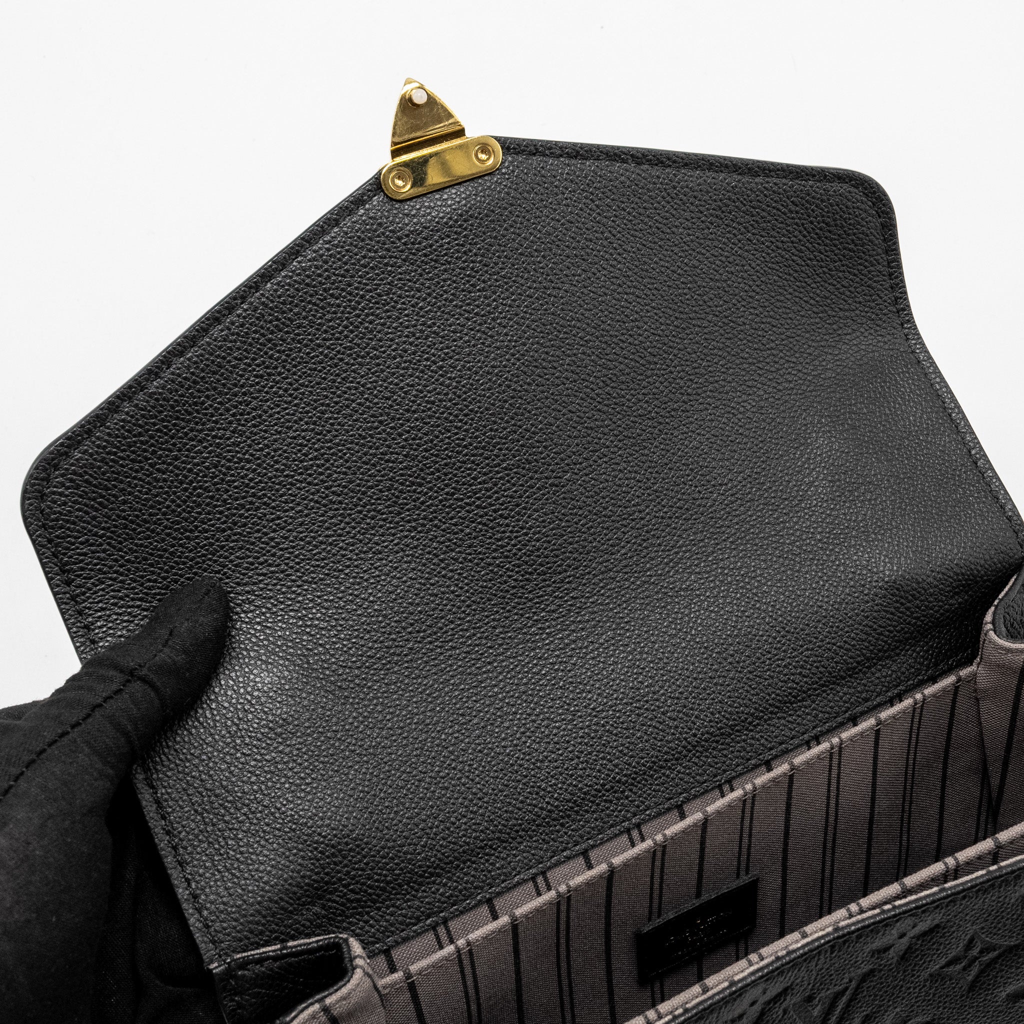 louis-vuitton-pochette-metis-monogram-empreinte-black-ghw-7